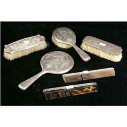 A GROUP OF SIX STERLING SILVER HANDLED DRESSER ITEMS