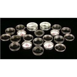 A GROUP OF TWENTY THREE STERLING SILVER AND SILVER PLATTED MOUNTED GLASS COASTERS