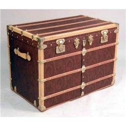A CONTEMPORARY BRASS MOUNTED AND FABRIC COVERED TRAVELING TRUNK