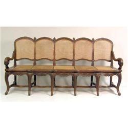 AN UNUSUAL ROSEWOOD CANED SETTEE