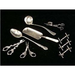 A GROUP OF NINE SILVER PLATED SEERVING PIECES