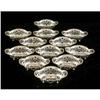 Image 1 : A SET OF TWELVE TIFFANY & CO. MAKERS SHAPED OVAL NUT DISHES