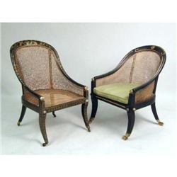 A REGENCY EBONIZED WOOD AND CANE TUB CHAIR