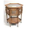 Image 1 : A VICTORIAN STYLE CARVED WALNUT OCTAGONAL TEA TABLE