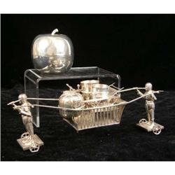 A CHINESE SILVER FIGURAL CONDIMENT HOLDER