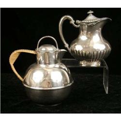 A SILVER PLATED SMALL COFFEEE POT