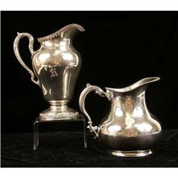 TWO SILVER PLATED WATER PITCHERS