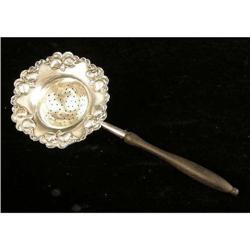 A PRYOR MFG CO., NEWARK STERLING SILVER WOODEN HANDLED TEA STRAINER