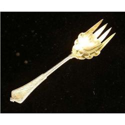 A TIFFANY & CO "PERSIAN" PATTERN (1872) STERLING SILVER SERVING FORK