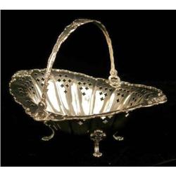 A TOWLE STERLING SILVER HANDLED OVAL FOOTED BASKET