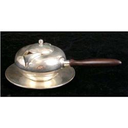 A GEORG JENSEN, USA, STERLING SILVER WOODEN HANDLED BRANDY WARMER WITH UNDERPLATE