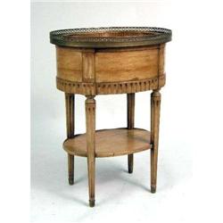 A FRENCH PROVINCIAL STYLE CARVED WALNUT OVAL JARDINIERE TABLE