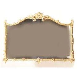 A LOUIS XV STYLE GILTWOOD MIRROR
