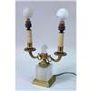 Image 1 : A LOUIS XVI STYLE CUT-GLASS AND GILT-METAL TWO-BRANCH CANDLESTICK-FORM LAMP