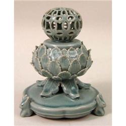 A GREEN-GLAZED POTPOURRI BOWL