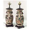 Image 1 : A PAIR OF ENAMEL-DECORATED POTTERY VASES