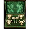 Image 1 : A BOXED SET OF ENGLISH STERLING SILVER FOUR SALTS WITH COLORLESS GLASS LINERS AND SALT SPOONS