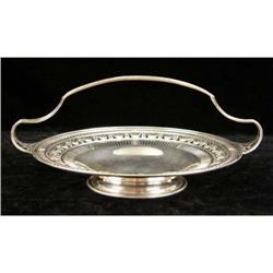 A BLACK STARR & FROST, NEW YORK STERLING SILVER HANDLED FOOTED BASKET