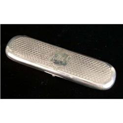 A SILVER PLATED OVAL HINGED FLAT BOX