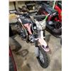 Image 1 : SMALL RED KO-R DIRT BIKE (WORKING CONDITION UNKNOWN)