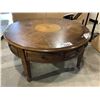 Image 1 : ROLLING COFFEE TABLE 40" DIAMETER