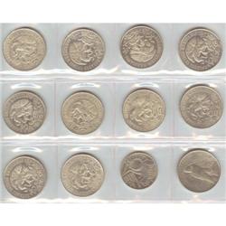 Lot of 12 world coins apx 6.5 oz of silver