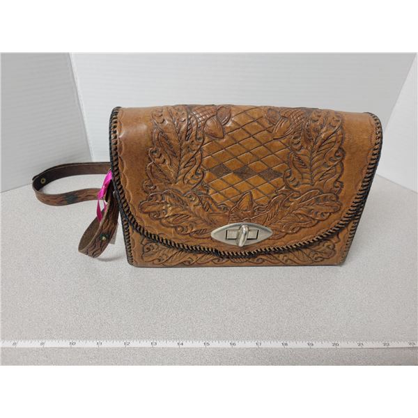 Hand tooled leather bag with a deer motif, 10”x7”, good condition