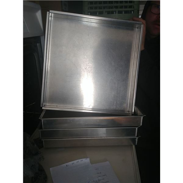 4 NEW STAINLESS PANS