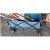 Image 2 : Folding wagon with bodyboard and hockey sticks