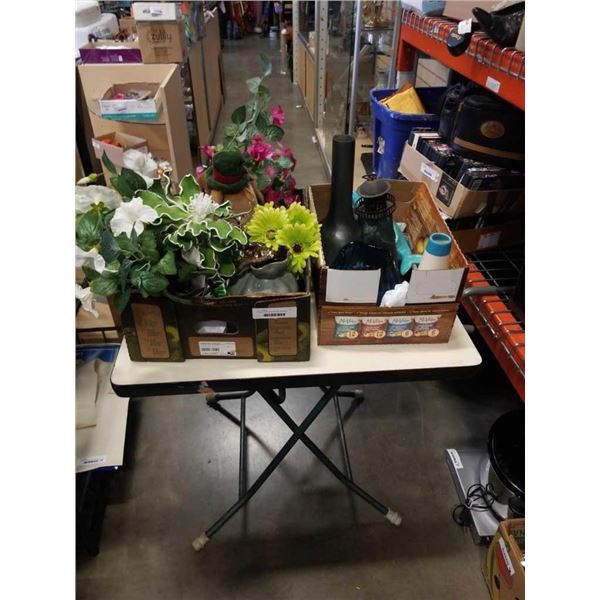 2 boxes of artificial flowers and collectibles