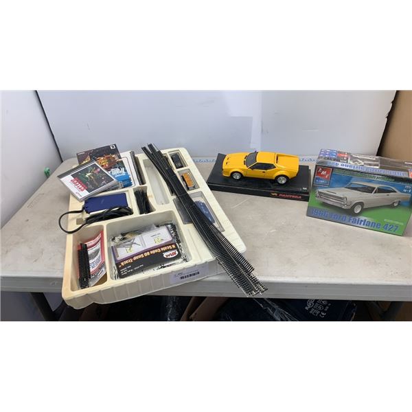 Tray of model n scale train track and 2 models