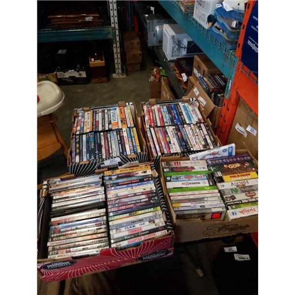 4 TRAYS OF DVDS AND VIDEOGAMES