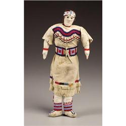 A PLATEAU OR BLACKFEET BEADED HIDE FEMALE