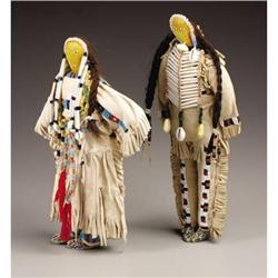 A PAIR OF SIOUS BEADED HIDE DOLLS c. 19
