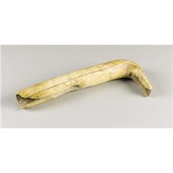 A PLAINS ELK ANTLER HIDE SCRAPER