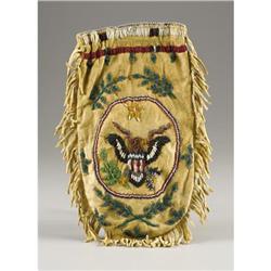 A SIOUX BEADED HIDE POUCH c. 19