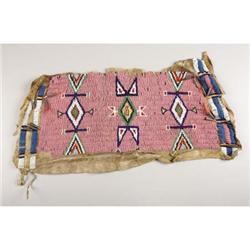 A SIOUX BEADED HIDE FRAGMENT c. 19