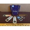 Image 1 : LOT OF 7 - VARIOUS COMMEMORATIVE BOTTLE OPENERS IN A CLASSIC CROWN ROYAL BAG