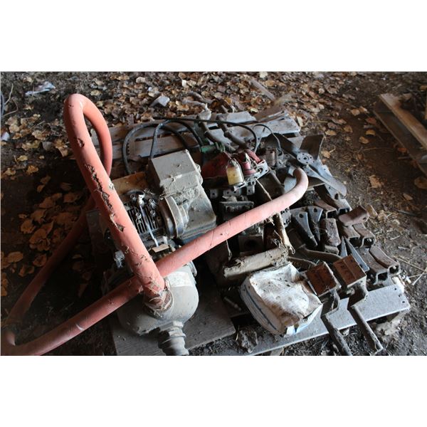 5hp Brigg & Stratton water pump, fence stretcher, bucket teeth etc (everything on pallet)