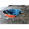 Image 1 : Wheelbarrow with garden hose