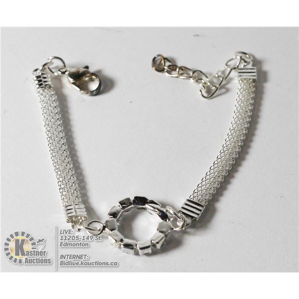 SILVER TONE CIRCLE BRACELET WITH WHITE STONES