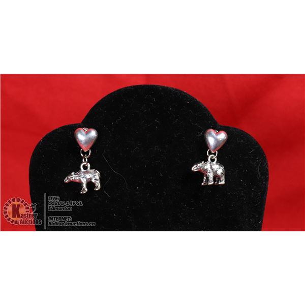 SILVER BEARS ON SILVER POSTS.