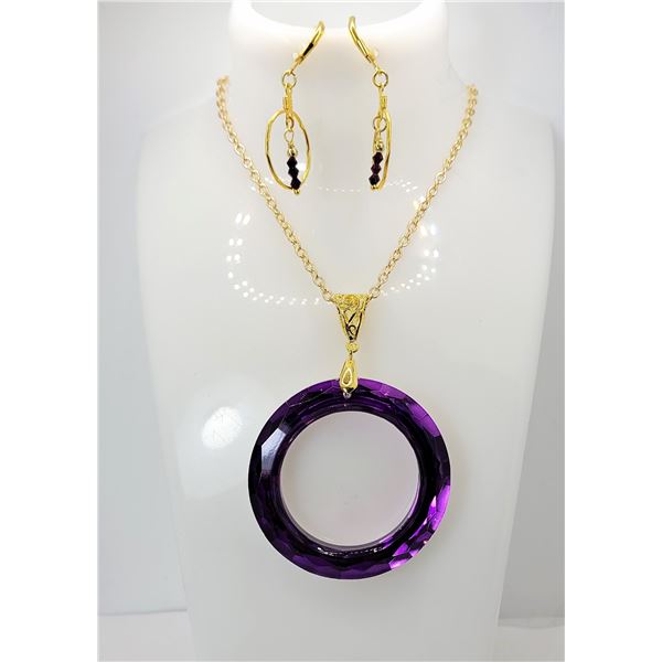 21)  GOLD TONE WITH PURPLE TITANIUM CRYSTAL