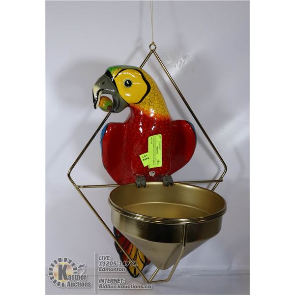 LARGE PARROT SITTING ON BRASS HOLDER