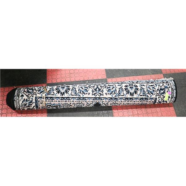 4' X5.8' RUG WITH FLORAL PATTERN