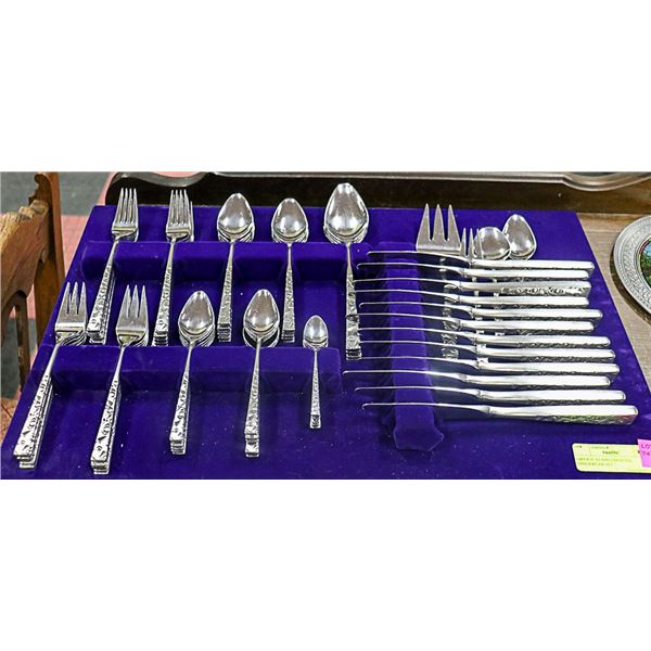 ORNATE STAINLESS STEEL DINNERWARE SET