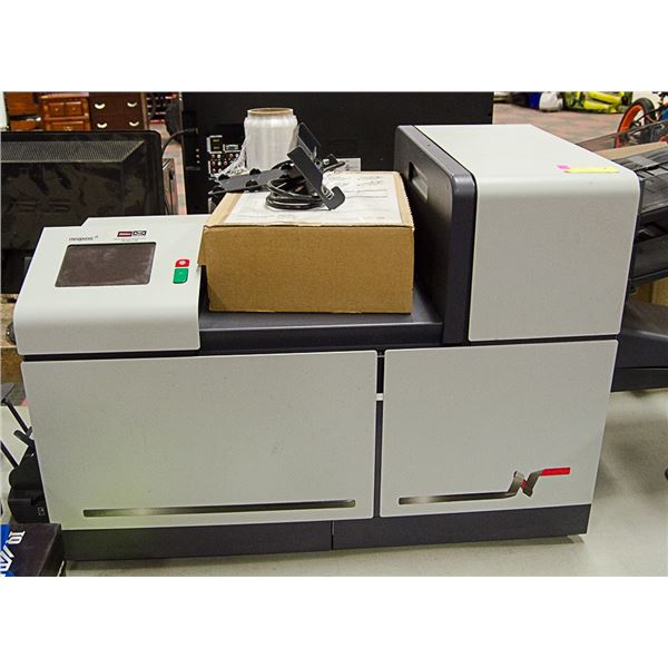 POSTAGE MACHINE  STUFFS ENVELOPES, LABELS, AND