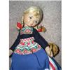 Image 1 : Old Cottage Doll with braids carrying a basket #1847456