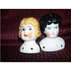 Two China heads, one black hair, one blonde #1847482