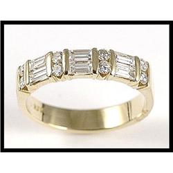 A Classic 14K Yellow Gold Diamond Band #1886867